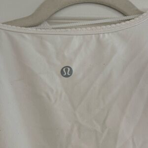 White LuluLemon wrap top. Never worn.